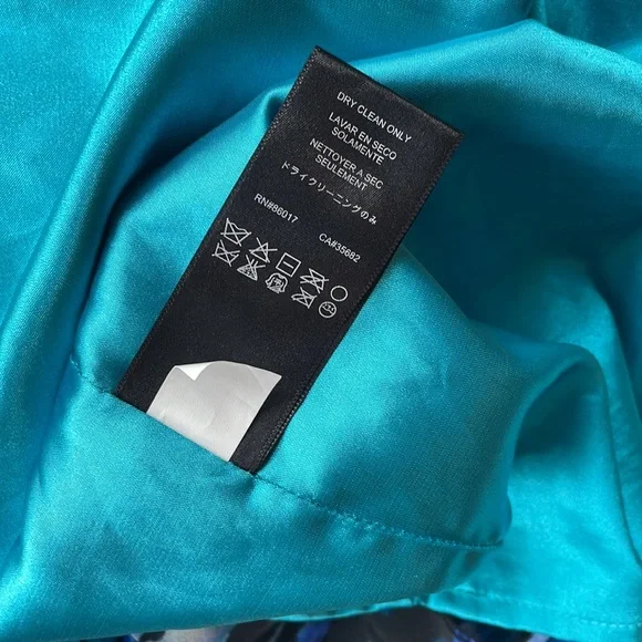 Bebe Blue Turquoise Leopard Halter Mini Dress. Zip up back. Size small - Picture 8 of 8